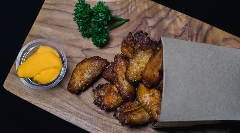 crispy chicken wings with buffalo sauce